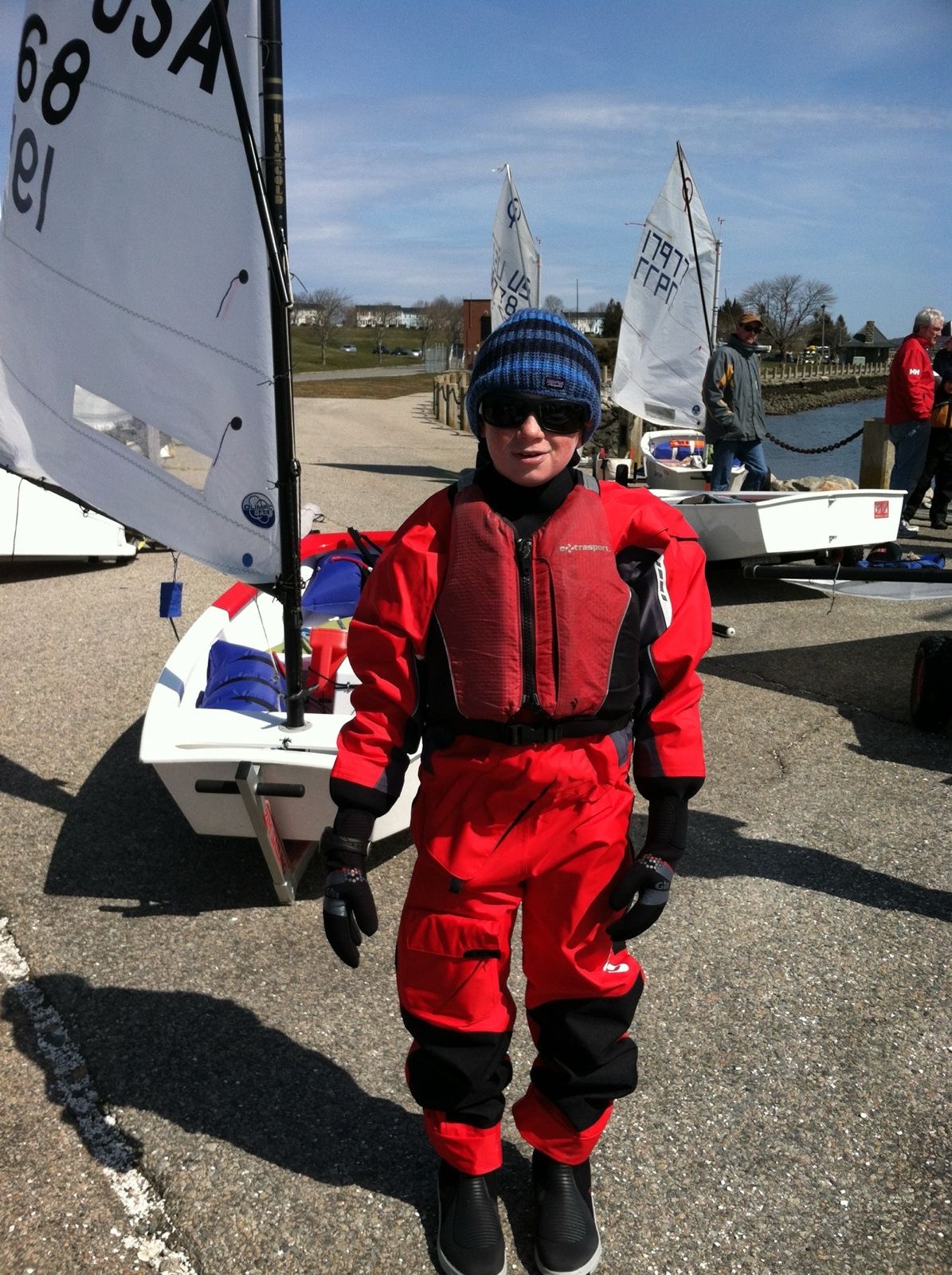 Ben preparing to race his Optimist